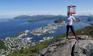 Maddy on the Sugar Mountain, Sukkertoppen, overlooking Ã
lesund, Norway