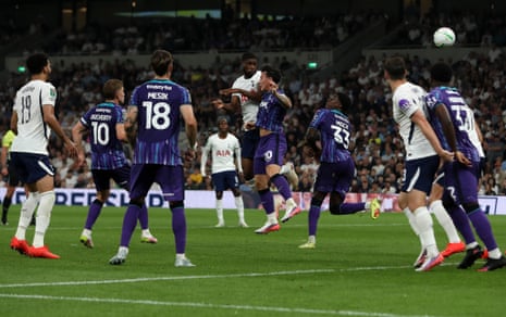Kevin Danso of Tottenham Hotspur scores from a header.