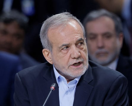 Masoud Pezeshkian speaking into mic earlier in 2025