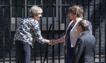May and Foster shake hands outside Downing Street.