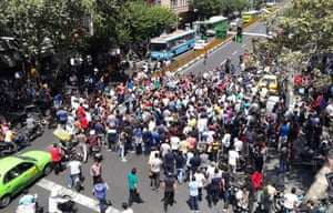 Protesters clashed with police in Tehran during the currency protest, witnesses said.