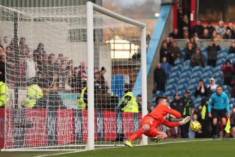 Nick Pope of Burnley saves the penalty.