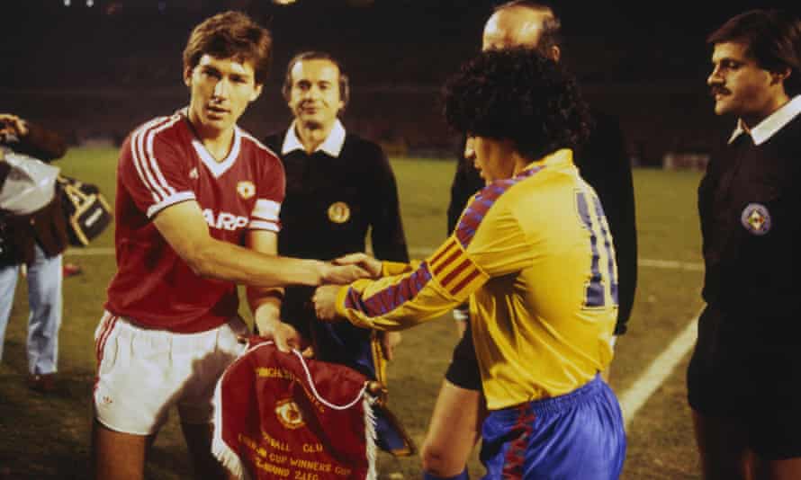 The Manchester United captain Bryan Robson shakes hands with the Barcelona captain Diego Maradona before the European Cup Winners’ Cup quarter-final second leg.