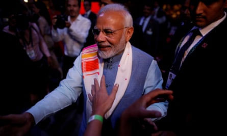 Narendra Modi greets attendees at an event ahead of the G20 summit in Buenos Aires