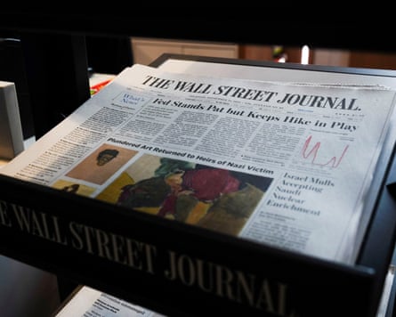 Copy of Wall Street Journal in a tray
