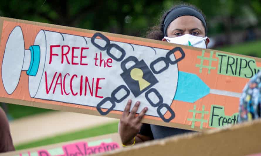Activists rally in Washington DC to demand global access to Covid vaccines. The proposal to waive patent protections on vaccines for the duration of the pandemic has been supported by more than 100 countries, including the US, but Australia remains opposed.