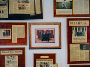 John Boyd Jr’s home is decorated with stories and photos of his trips to Washington DC to meet with lawmakers and presidents in his fight for black farmers’ rights.