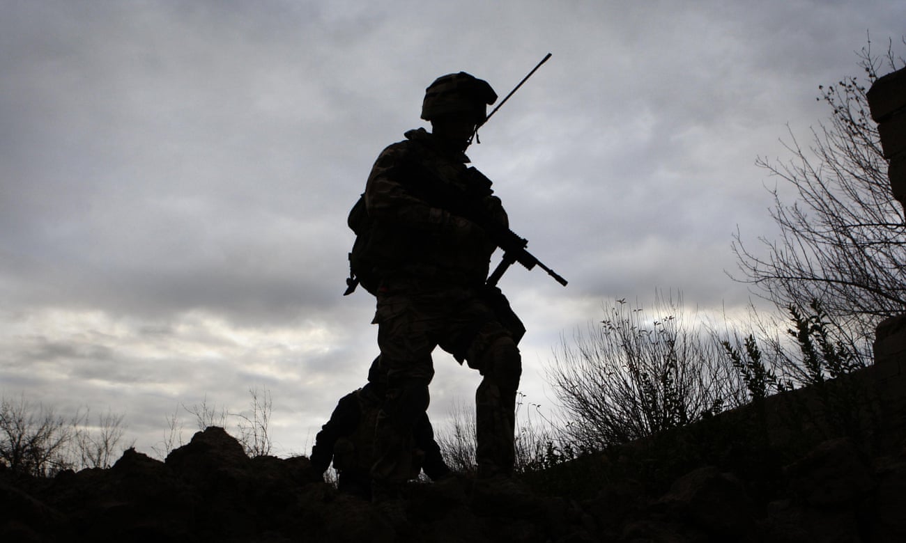 A Royal Marine on patrol in the Sangin district of Afghanistan.
