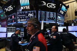 Traders on the floor of the New York Stock Exchange yesterday.