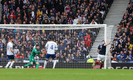 John McGinn scores their first goal.