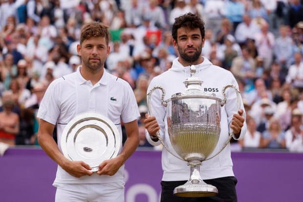 Serbia's Filip Krajinovic (left) had never won a main-draw match on grass before reaching the final at Queen's in 2022.