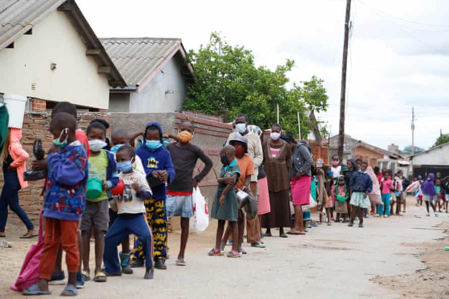 A queue of people outside Samantha Murozoki’s home