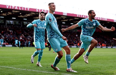 Sasa Kalajdzic (centre) leads the Wolves celebrations after his winner at Bournemouth.
