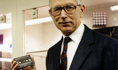 Lou Ottens holding an audio cassette in 1988, a quarter of a century after it make its debut at a Berlin trade fair.