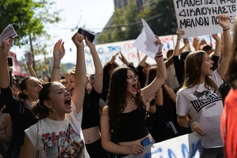 Students in Athens chant slogans and raise placards in a demonstration calling for better school conditions