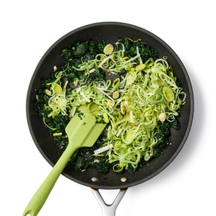Felicity Cloake’s strata – spinach and leek in a pan
