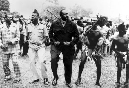 people dance outside in a line