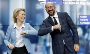 European commission president, Ursula von der Leyen, and European council president, Charles Michel, bump elbows early on Tuesday after finally sewing up a coronavirus recovery plan.