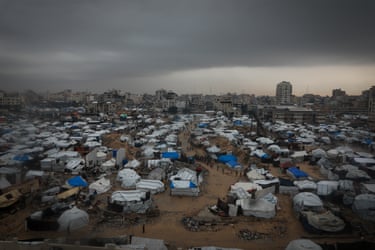 Heavy rains flood thousands of tents sheltering displaced civilians in Gaza