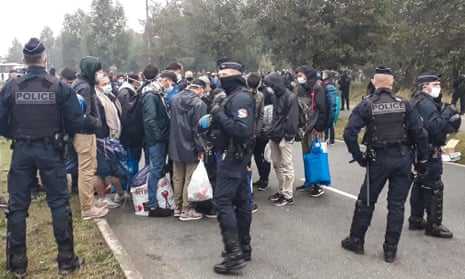 Police moved about 700 migrants after they dismantled their camp in Calais, northern France.