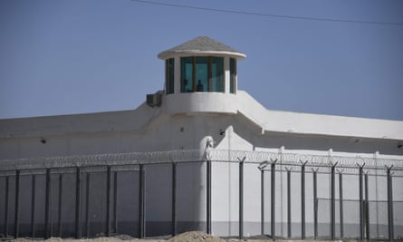 This file photo taken on 31 May 2019 shows a watchtower on a high-security facility near what is believed to be a re-education camp where mostly Muslim ethnic minorities are detained, on the outskirts of Hotan, in Xinjiang region. Photograph: Greg Baker/AFP/Getty Images