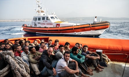 Afghan migrants rescued at sea arrive in Catania, Italy.