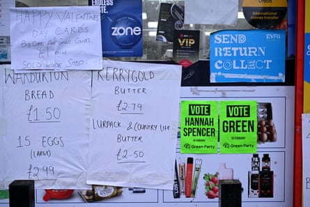 Posters for the Green party candidate Hannah Spencer on a noticeboard in Gorton