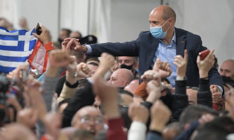 Malta's deputy prime minister, Chris Fearne, celebrates in the counting hall in Naxxar as provisional election results indicated a Labour victory