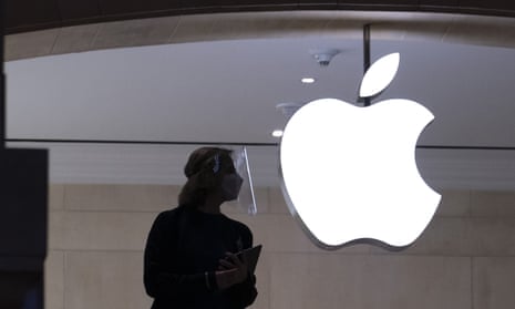 An Apple store employee is shown in New York
