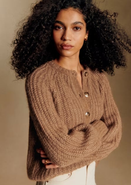A model wearing a Sezane Emile Cardigan
