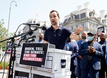 Ezra Levin speaks from a podium