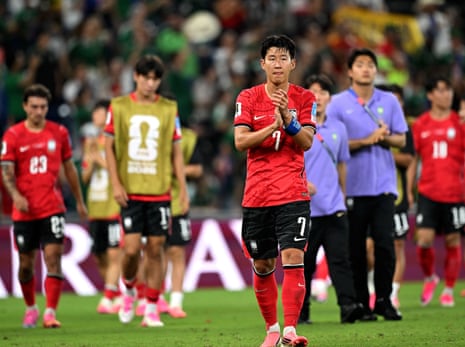 Son Heung-Min applauds fans after Korea’s defeat to South Africa