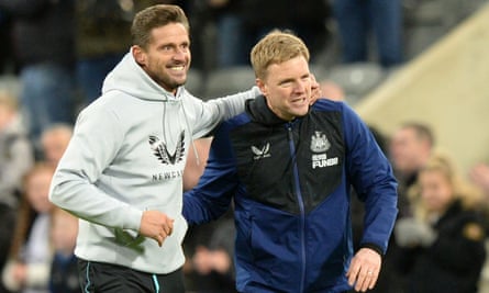 Eddie Howe and his assistant Jason Tindall celebrate their first Newcastle win