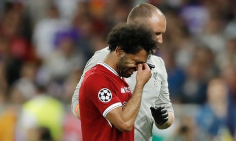 Mo Salah walks from the field with tears in his eyes after a sustaining an injury during a tussle with Real Madrid’s Sergio Ramos. 