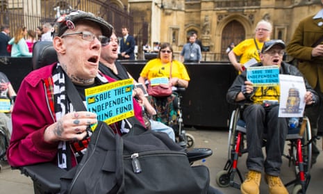 A protest by disability rights campaigners in Westminster in June 2015