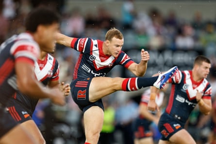 Daly Cherry-Evans of the Roosters kicks