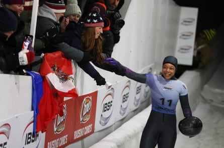 Mystique Ro of the United States celebrates her world silver medal on Friday at the 2025 IBSF World Championships at Mt Van Hoevenberg in Lake Placid, New York.