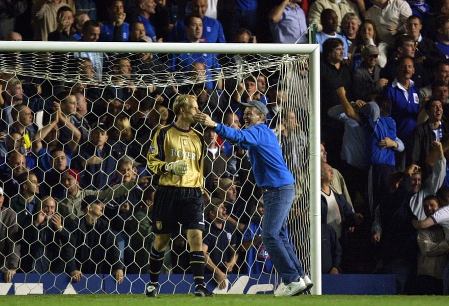 A Birmingham City fan shows his appreciation to Aston Villa keeper Peter Enckelman after his gaffe in 2002.