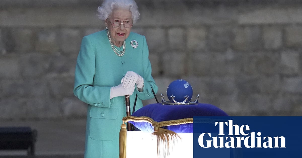Queen leads lighting of jubilee beacons but will miss St Paul’s service