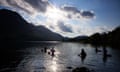 BUTTERMERE, 21 June 2021 - Five frriends making their longest swim on the longest day, the 1.24 mile length of Buttermere in the Lake District. Christopher Thomond for The Guardian.