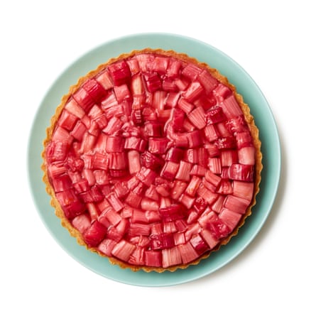 Once the rhubarb and the tart are completely cool, arrange the rhubarb in concentric circles on top, shaking off any syrup before doing so. Use the excess syrup to brush the top of the rhubarb, then slice and serve.