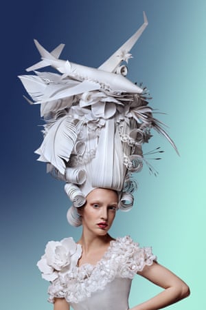 Paper hat fashion creation by Ukrainian artist Asya Kozina.