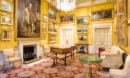 Apsley House, London - richly decorated room with many paintings, including full-length male portrait over fireplace, and antique furniture