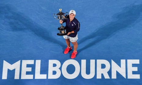 Ash Barty poses with the trophy after her straight-sets victory over Danielle Collins