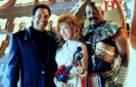 Jim Brown, right, with Tom Jones and Annette Bening in Mars Attacks!, 1996.