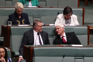 Anthony Albanese talks to Bob Katter on the crossbenches during question time in December 2018.