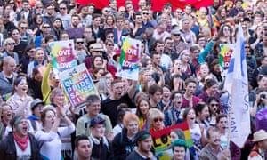 Activists march in the street during a rally in support of marriage equality in Sydney, Australia, 9 August 2015.