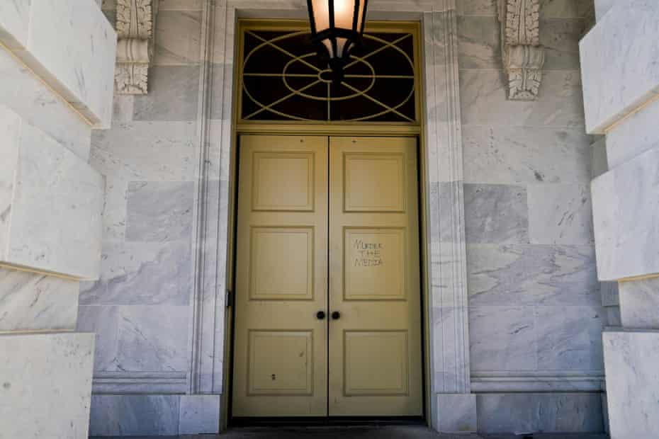 The phrase “Murder the media” is written on a door to the U.S. Capitol a day after supporters of U.S. President Donald Trump stormed the Capitol in WashingtonThe phrase “Murder the media” is written on a door to the U.S. Capitol a day after supporters of U.S. President Donald Trump stormed the U.S. Capitol Building in Washington, U.S., January 7, 2021.