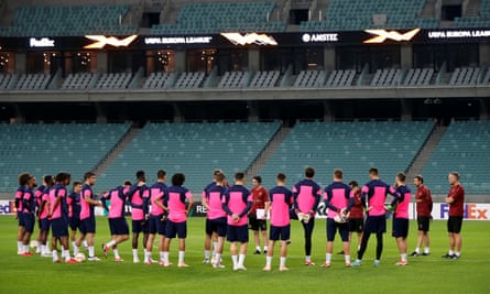 Emery speaks to his squad on the eve of the game against Qarabag in Baku. He likes to train on the match pitch as close to 24 hours before kick-off as possible.