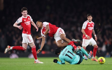 Hwang Hee-chan clatters in to Myles Lewis-Skelly to earn himself a yellow card